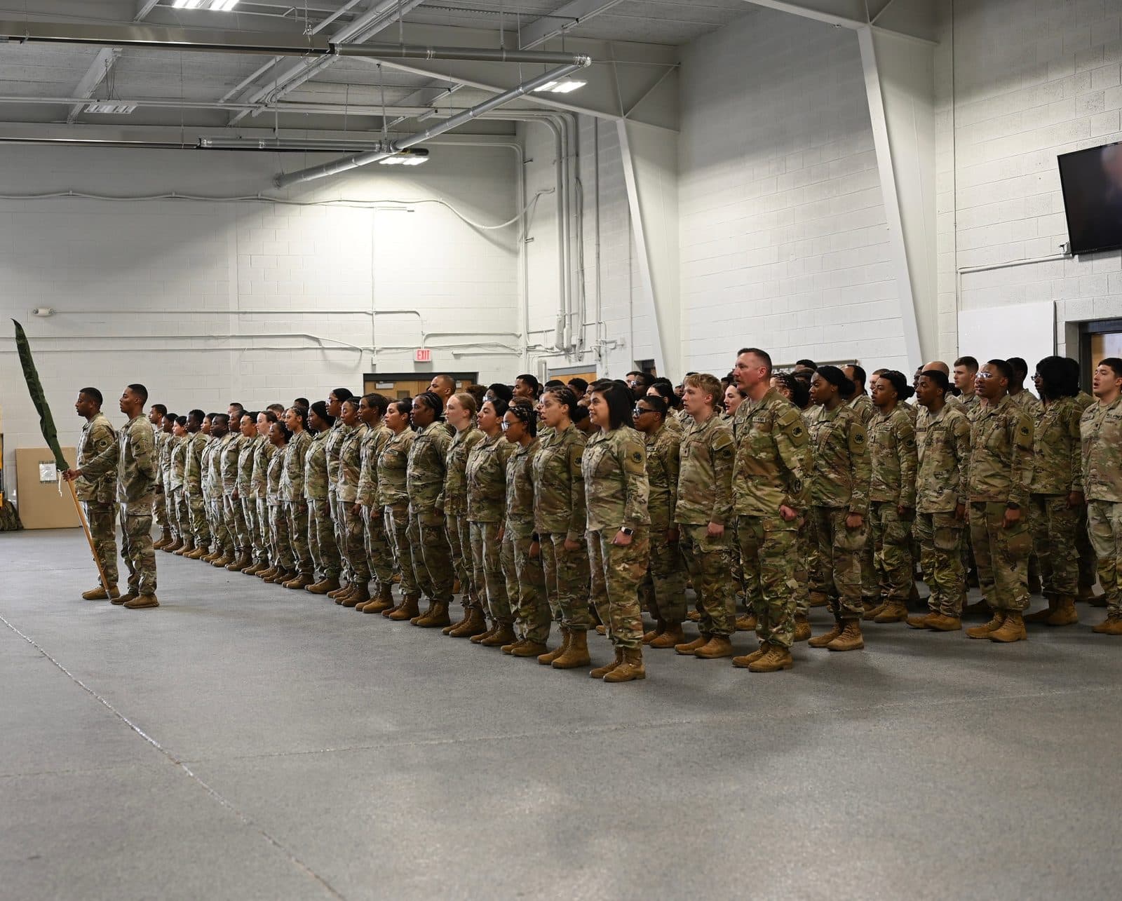 U.S. Army soldiers of the 1148th Transportation Company stand in formation during a departure ceremony